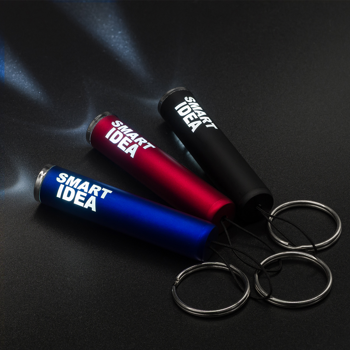 R17811.04 - Brelok-latarka z podświetlanym logo LumiRing, niebieski